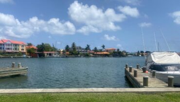 A THREE BEDROOM WATERFRONT PROPERTY FOR SALE IN RODNEY BAY