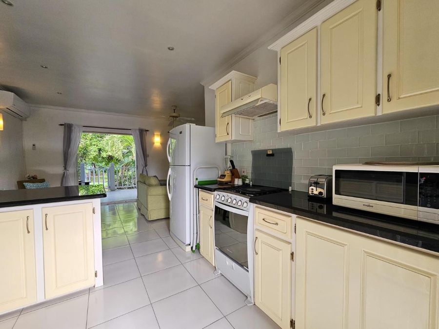 TRANQUIL GARDEN CONDOMINIUM FOR SALE LOCATED AT GATE PARK, CAP ESTATE, SAINT LUCIA
